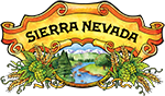 Sierra Neveada in black text against a old fashioned gold ribbon, beneath is a circular image of a river with bushels of branches on either side